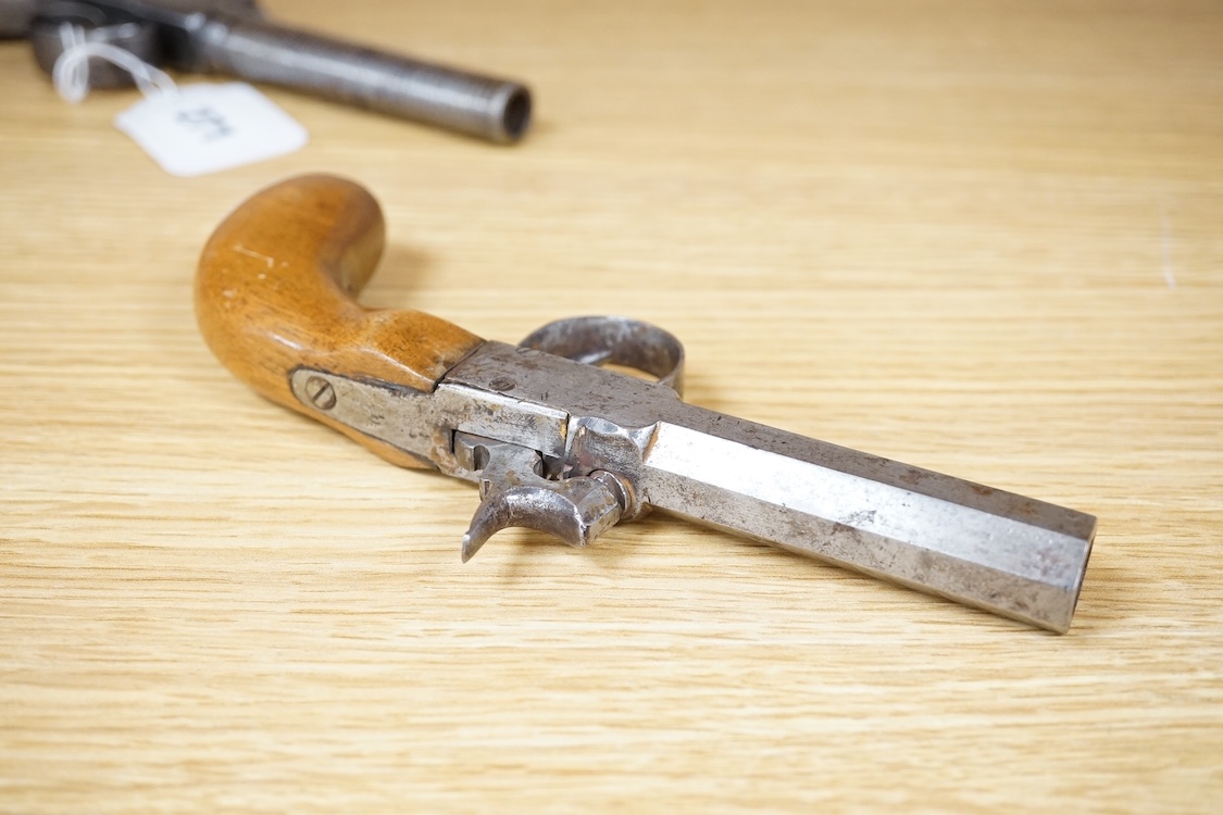 A Belgian boxlock percussion pocket pistol with octagonal barrel, hammer offset for sighting, and rounded wooden butt